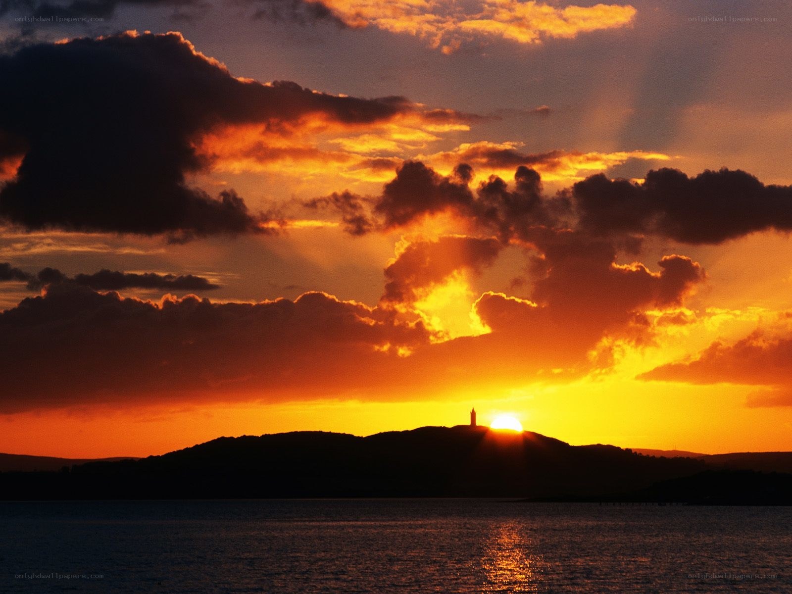 Sunset over a coastal hill
