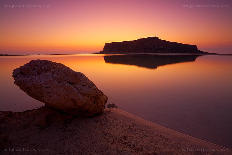 Sunset over a coastal island