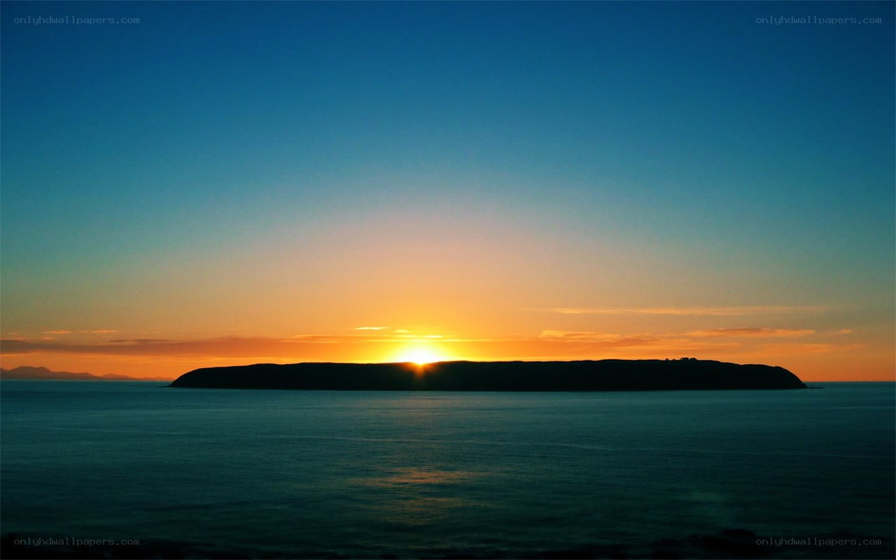 Sunset over a coastal island
