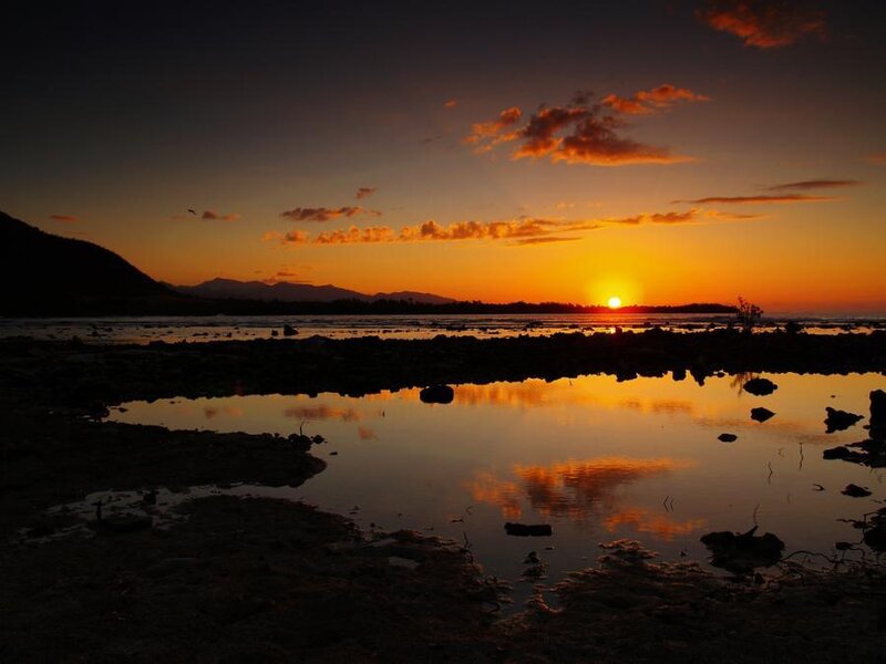 sunset over a coastal lagoon