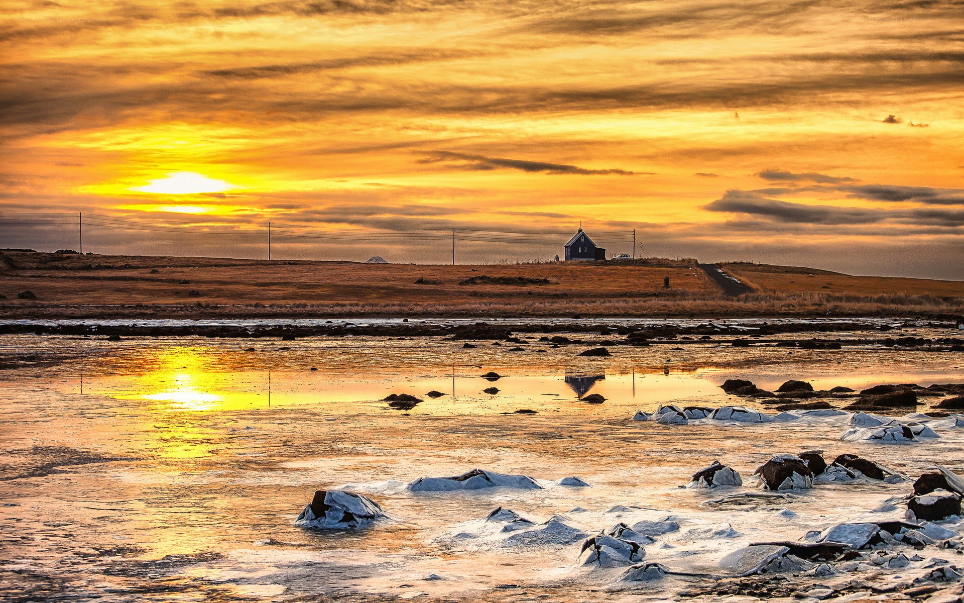 Sunset over a coastal landscape