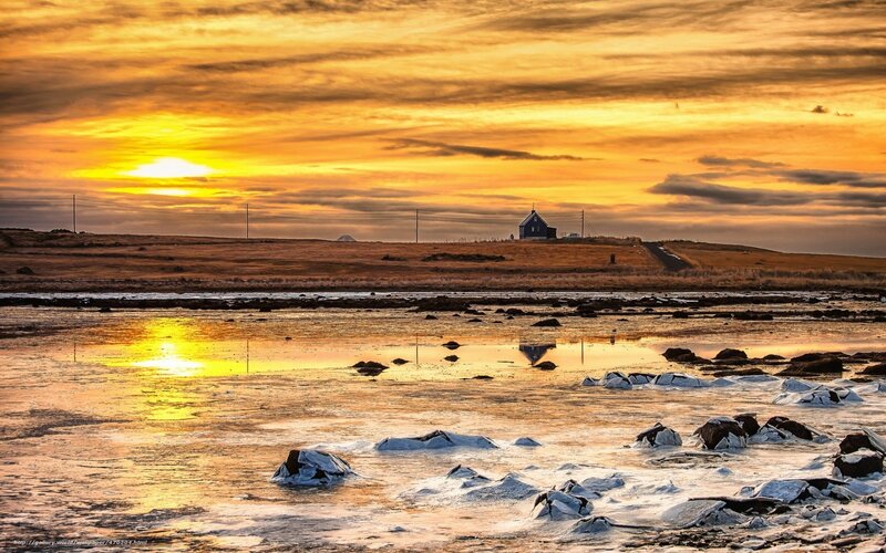 Sunset over a coastal landscape