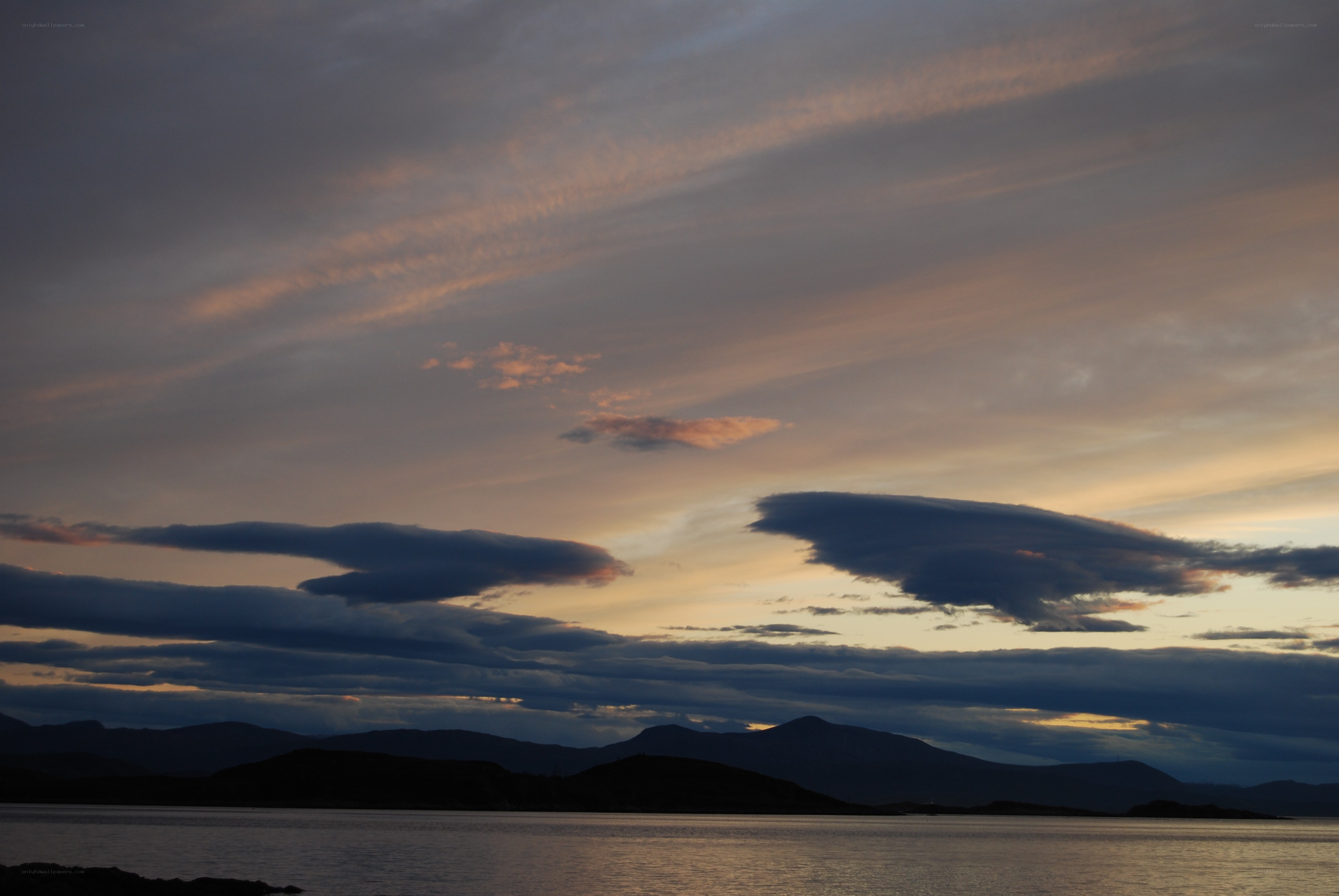 Sunset over a coastal landscape