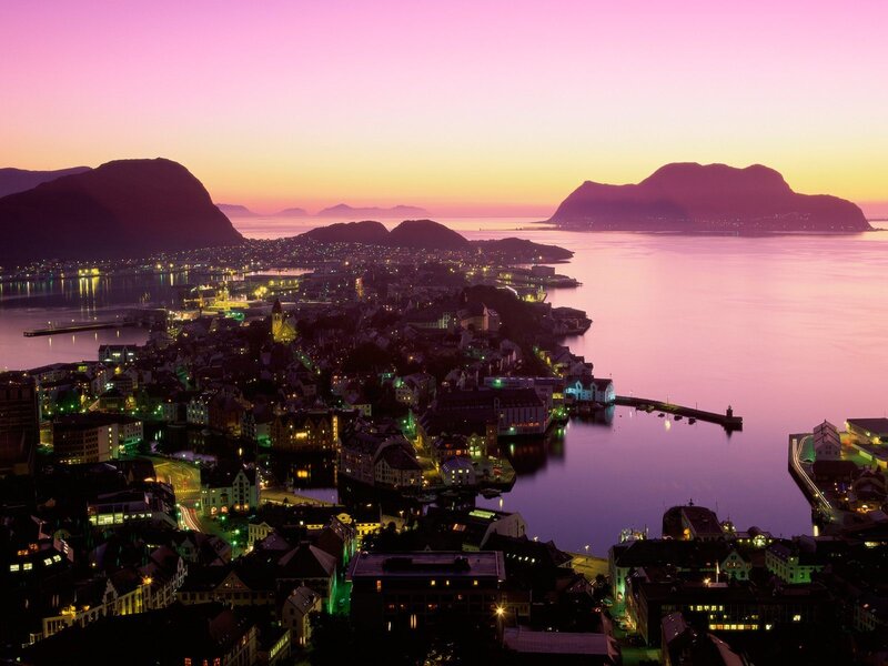 sunset over a coastal town