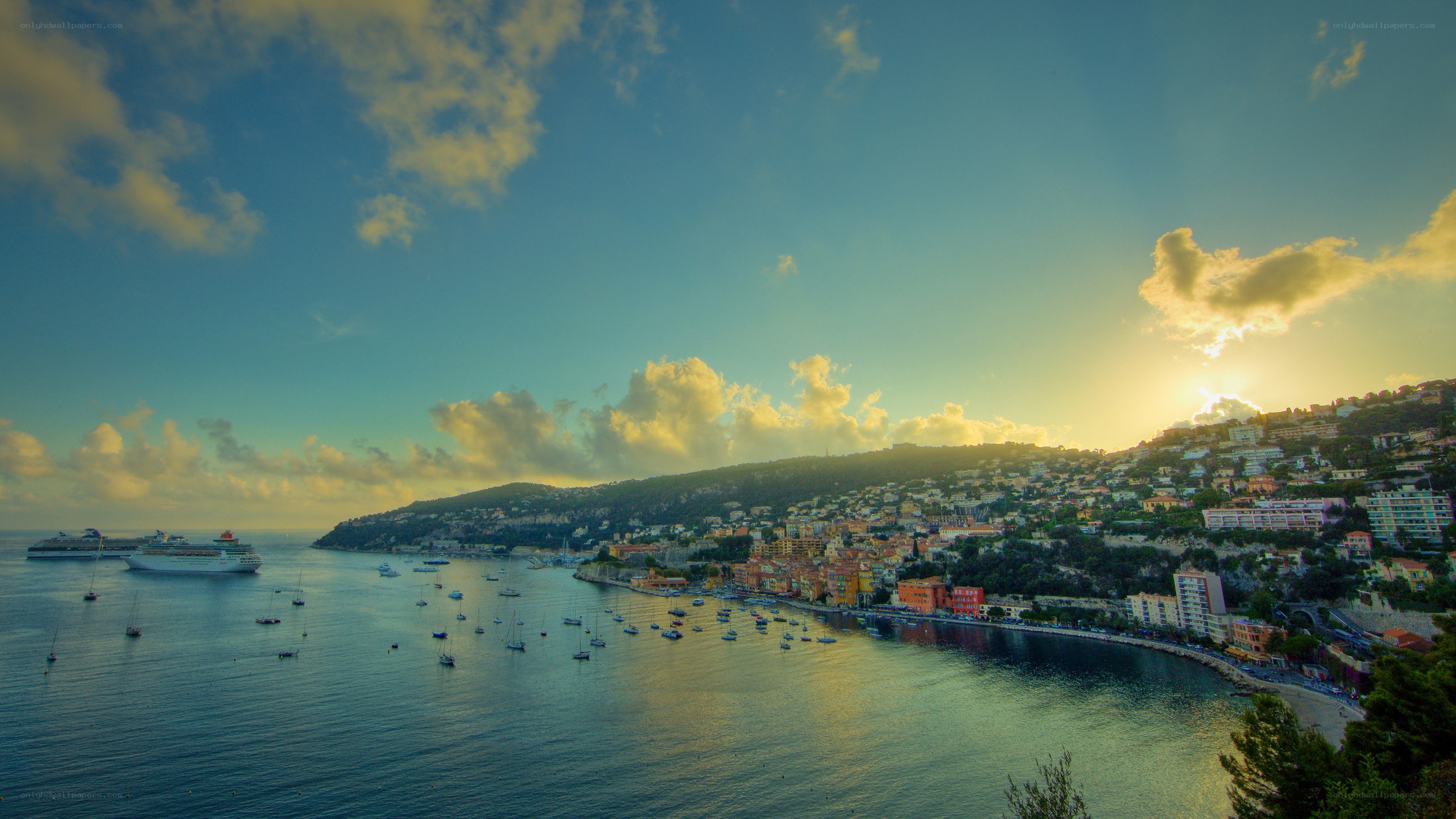 sunset over a coastal town