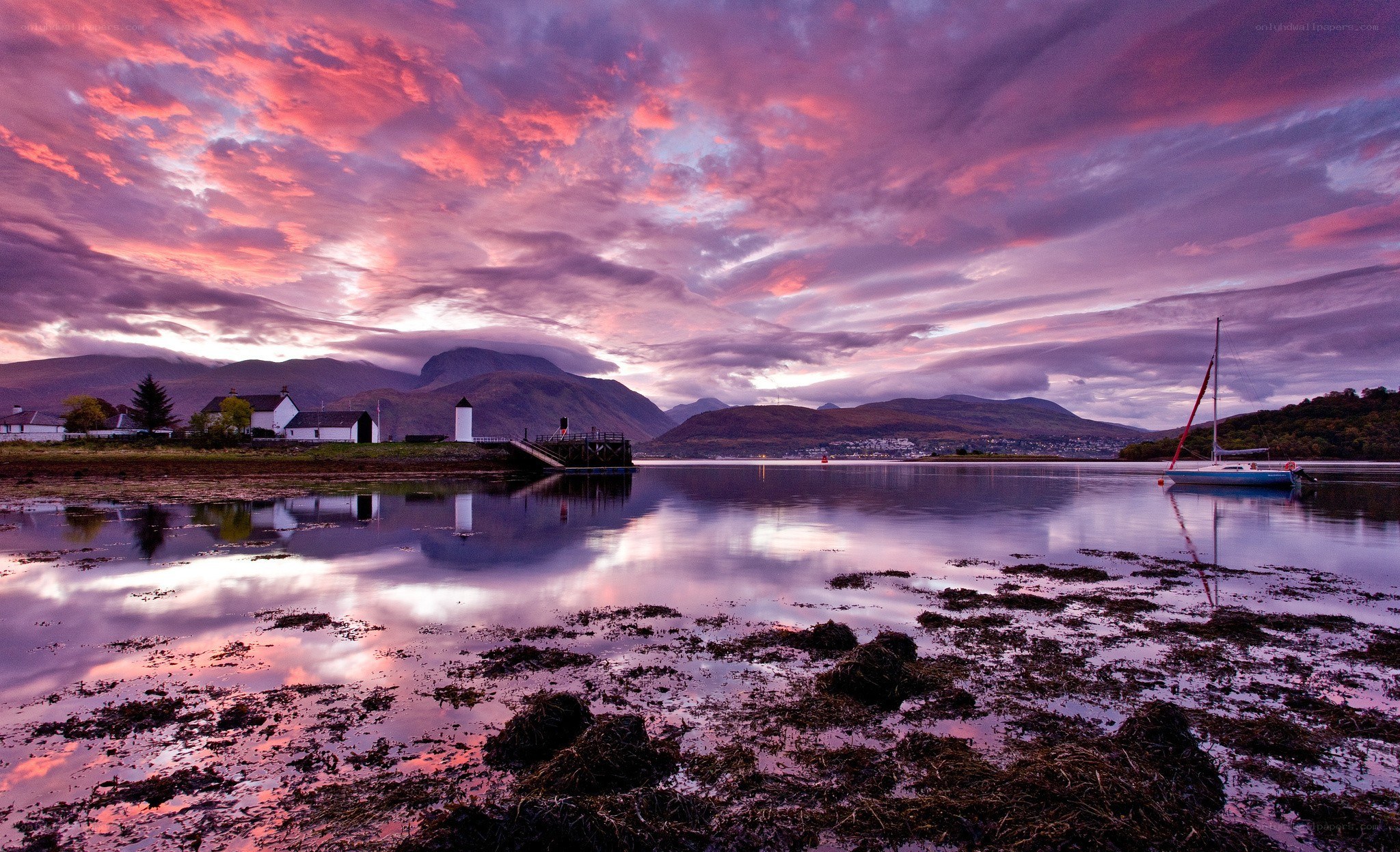 sunset over a coastal village