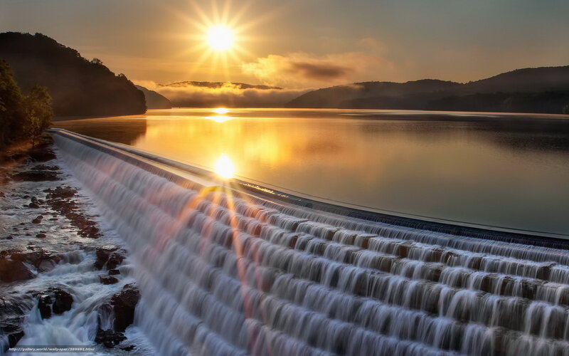 Sunset over a dam