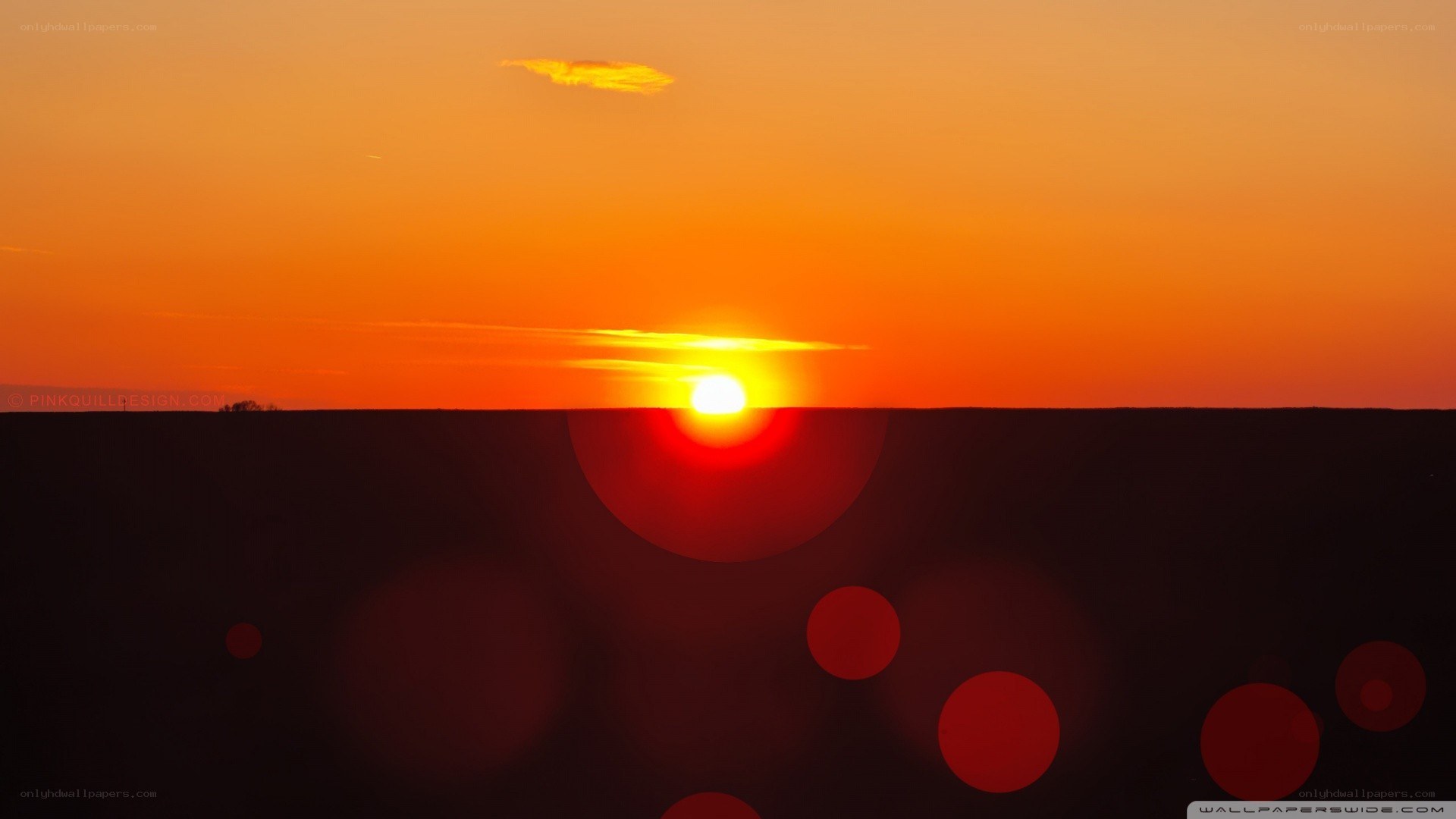 Sunset over a dark landscape