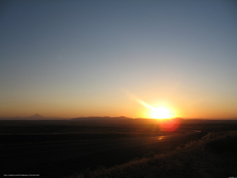 Sunset over a desert highway