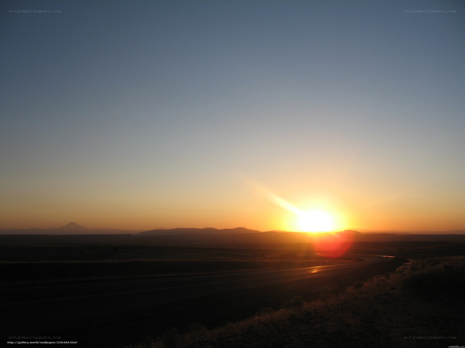 Sunset over a desert highway