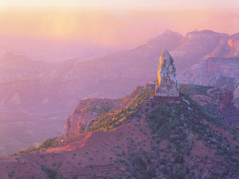 Sunset over a desert rock formation