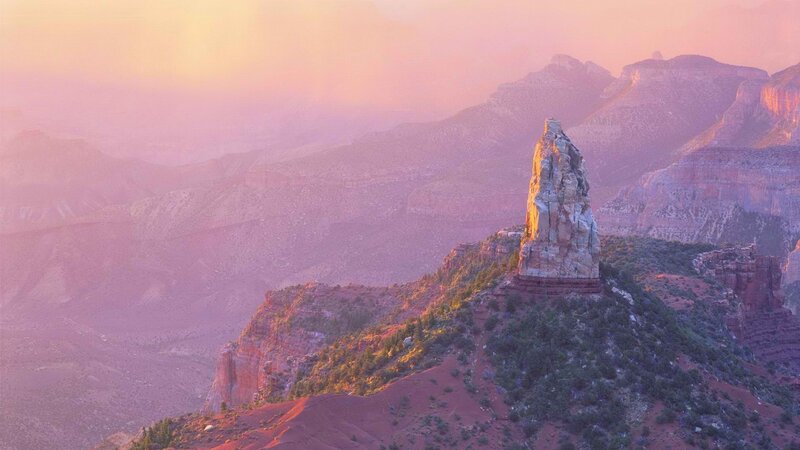 Sunset over a desert rock formation
