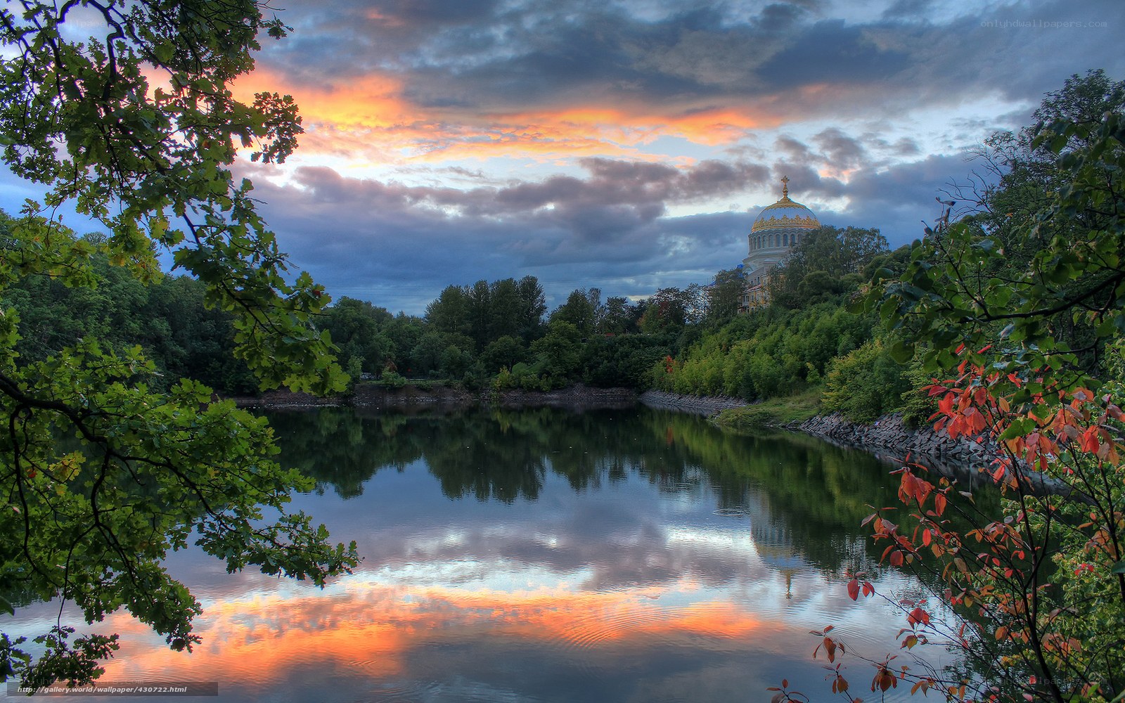 Sunset over a domed building