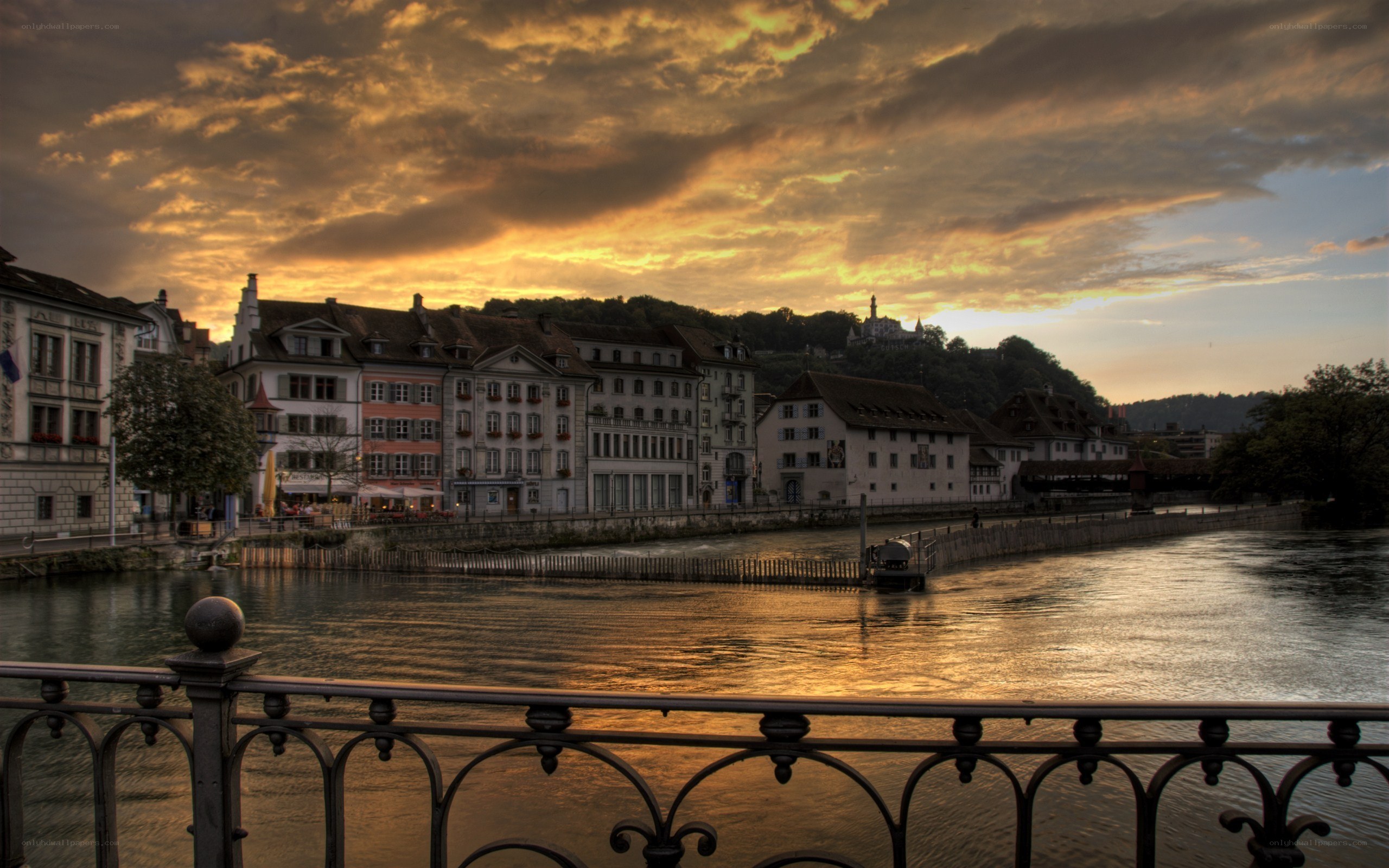 Sunset over a European riverside town