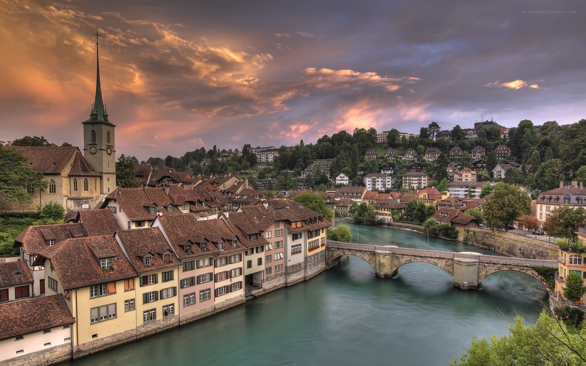 Sunset over a European riverside town