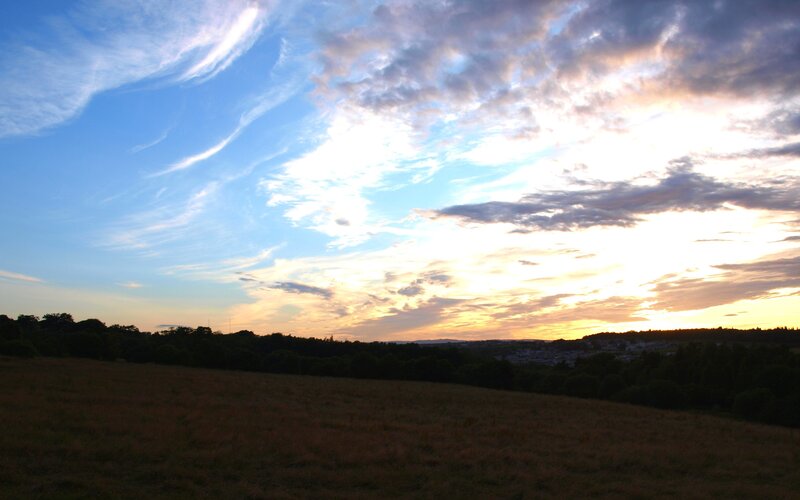 Sunset over a Field — Blue, Serene, Photograph, Sky