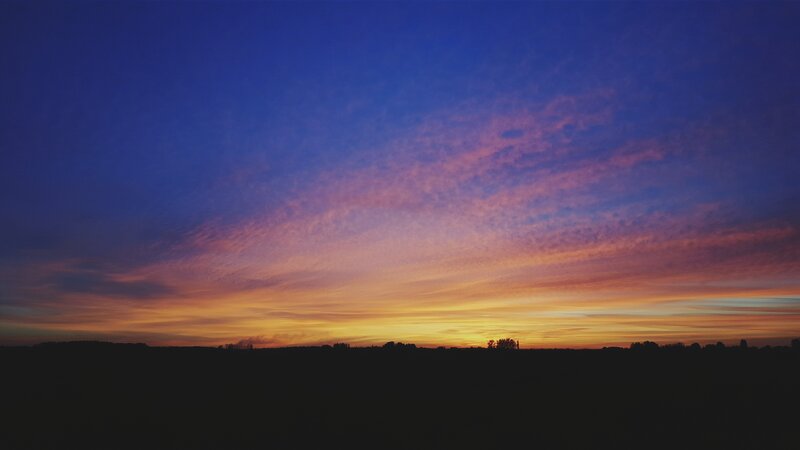 Sunset over a Field — Blue, Serene, Photograph