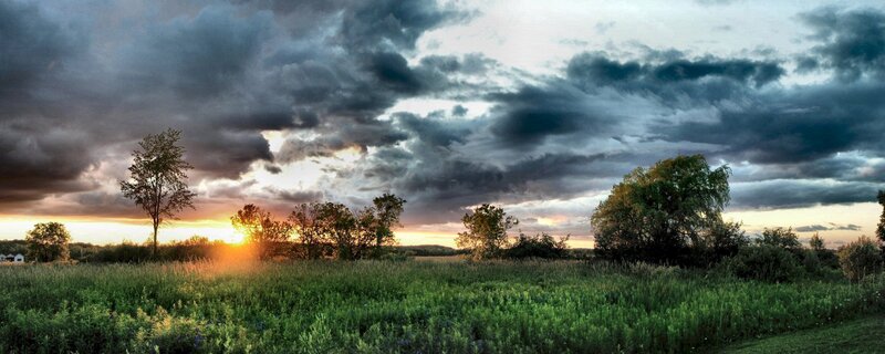 Sunset over a Field — Green, Dramatic, Photograph