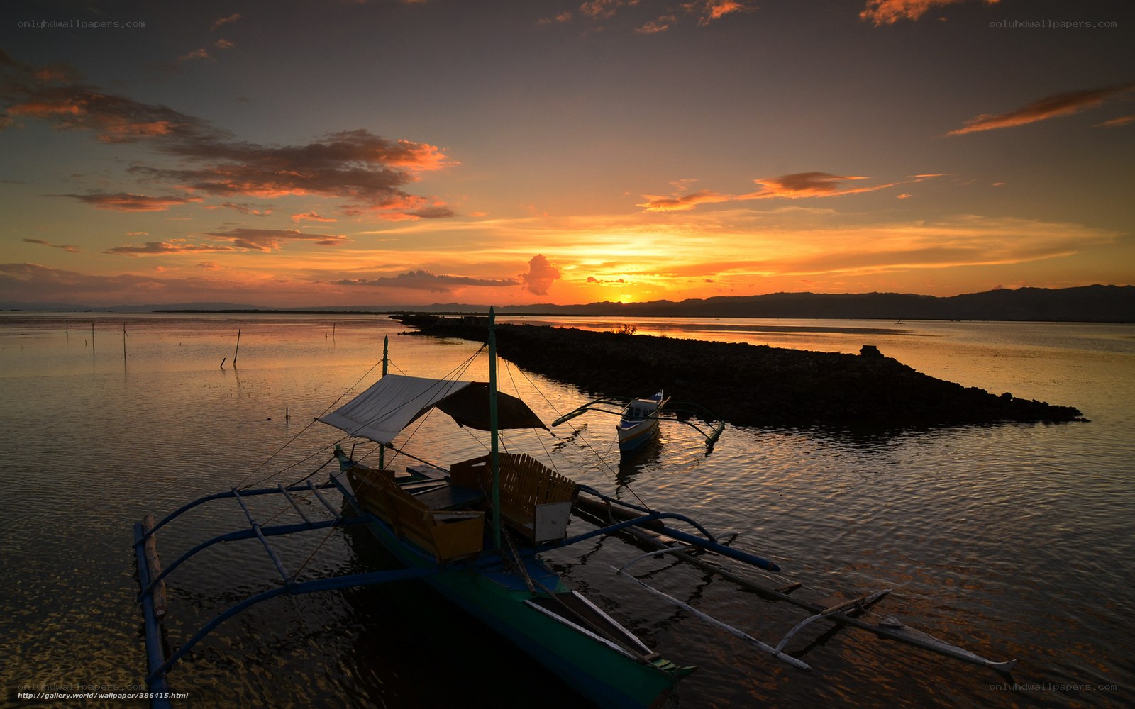 Sunset over a fishing boat