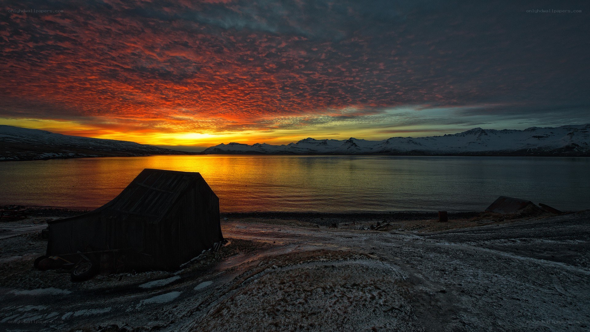 sunset over a fjord