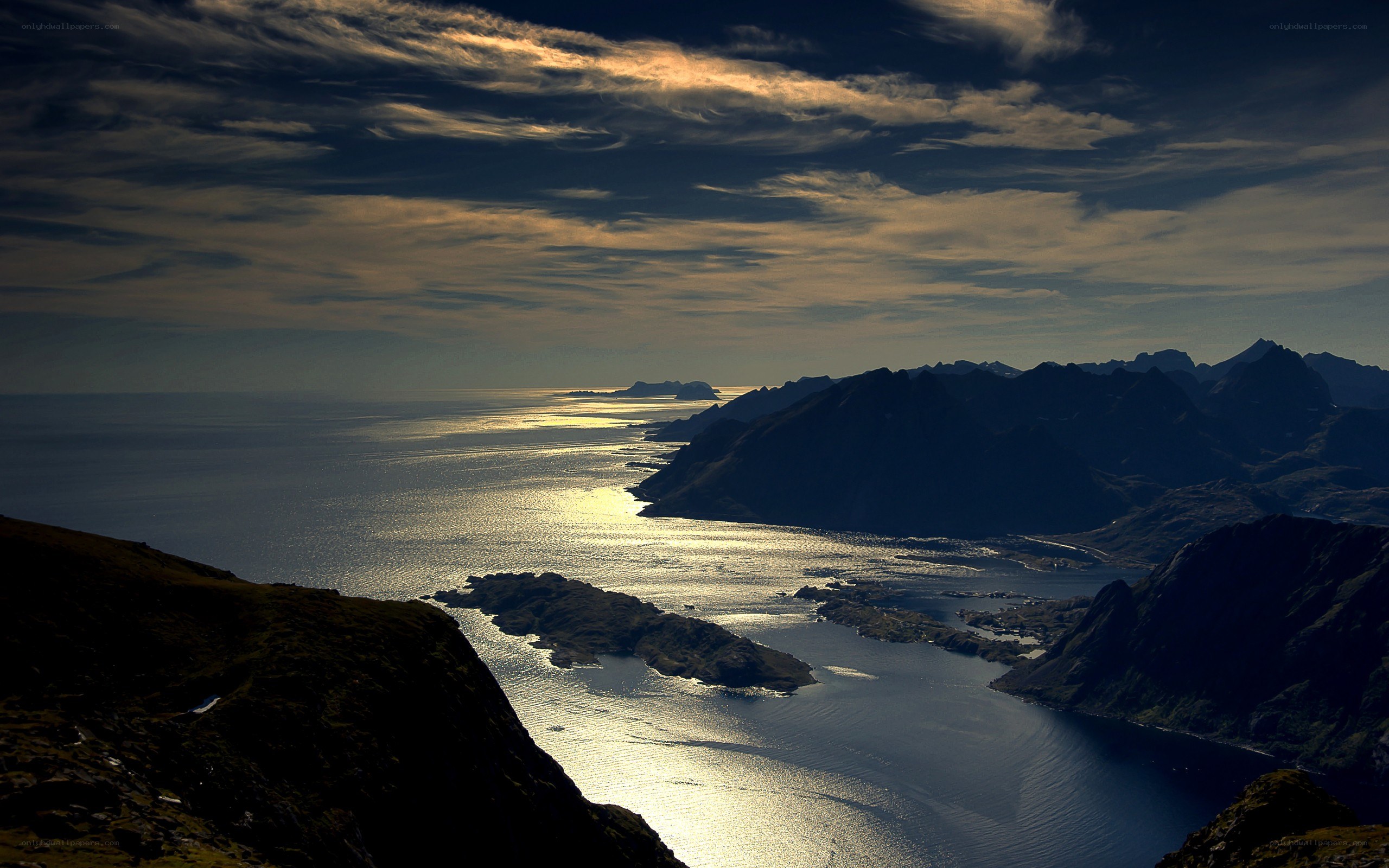 Sunset over a fjord landscape