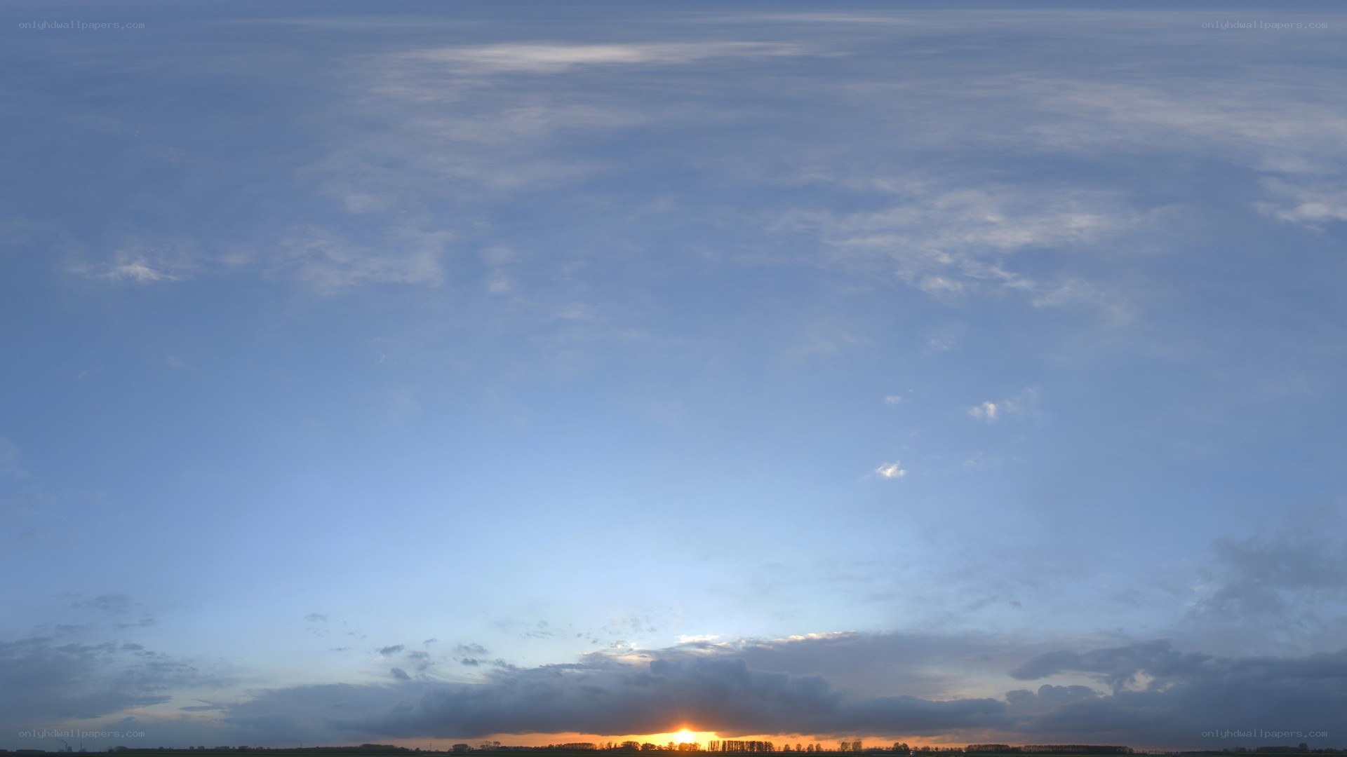 Sunset over a flat landscape