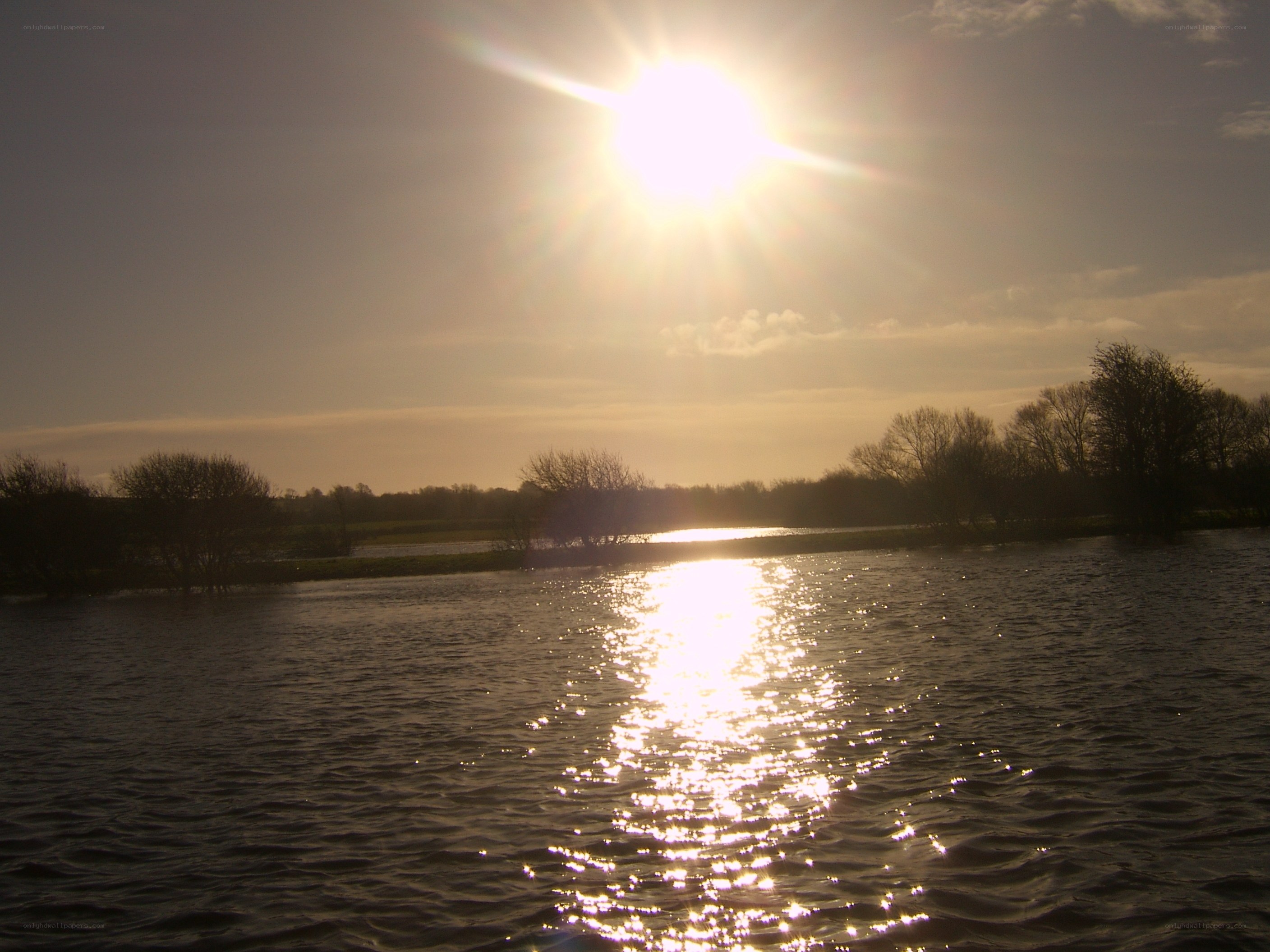 Sunset over a flooded landscape
