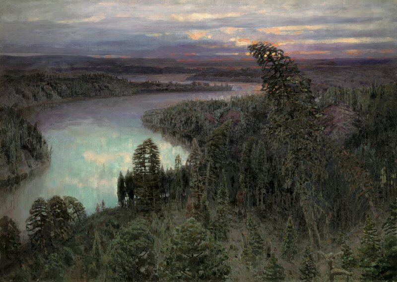 Sunset over a forest lake
