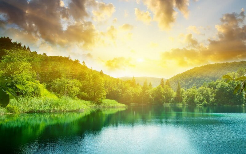 Sunset over a forest lake