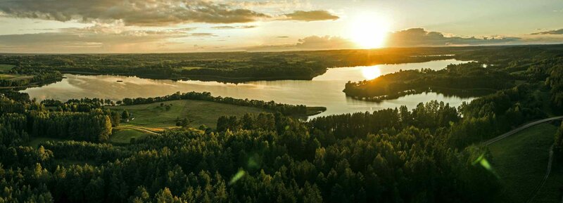 Sunset over a forest lake