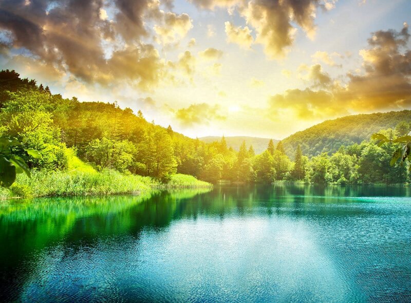 Sunset over a forest lake
