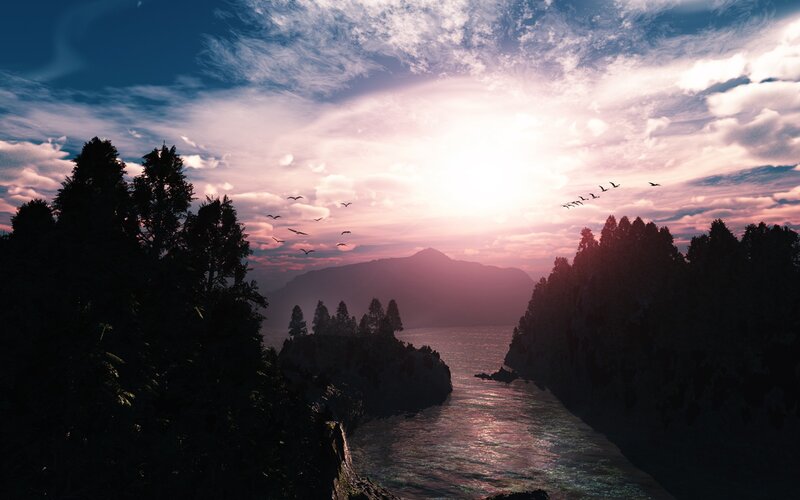 Sunset over a forested river