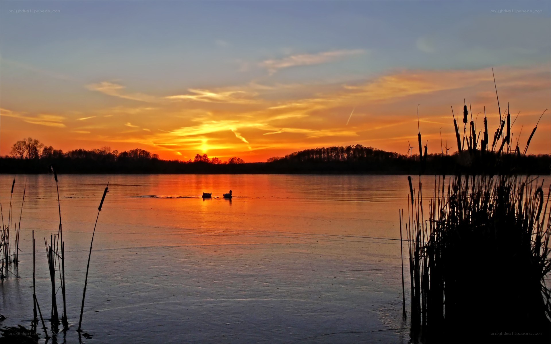 Sunset over a frozen lake