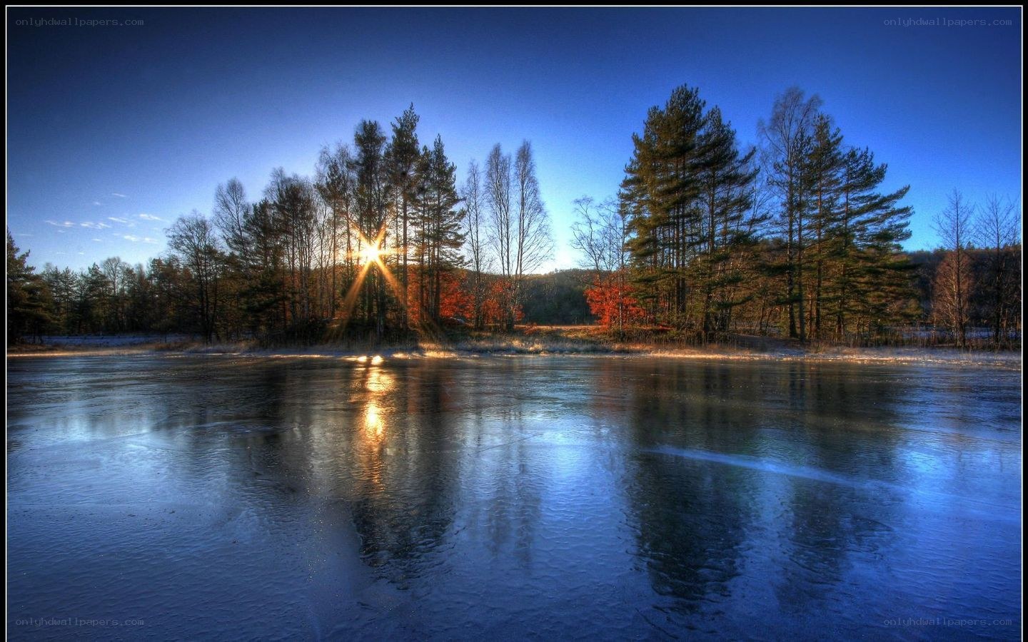 Sunset over a frozen lake