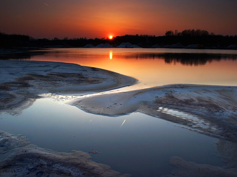 Sunset over a frozen lake
