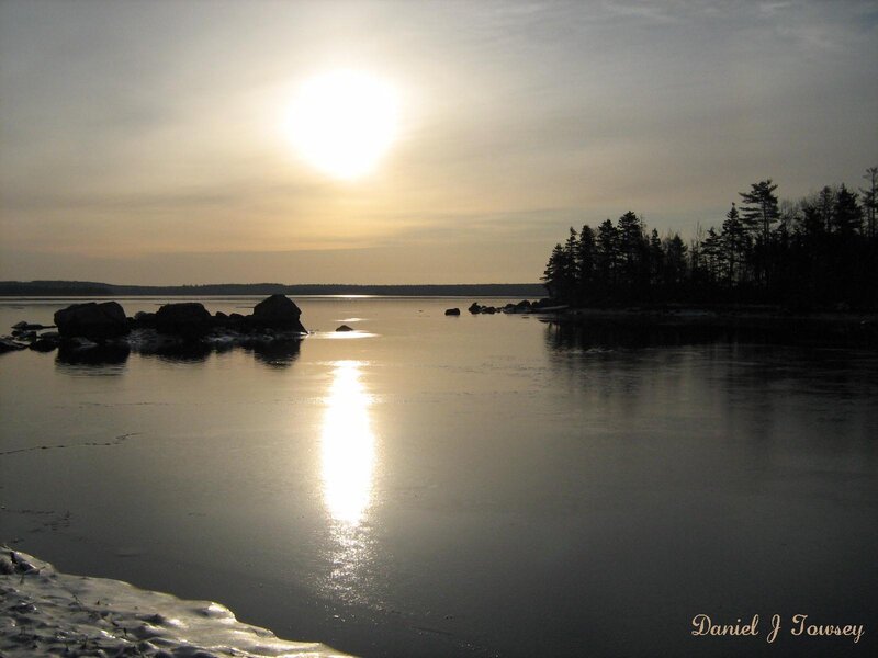 Sunset over a frozen lake