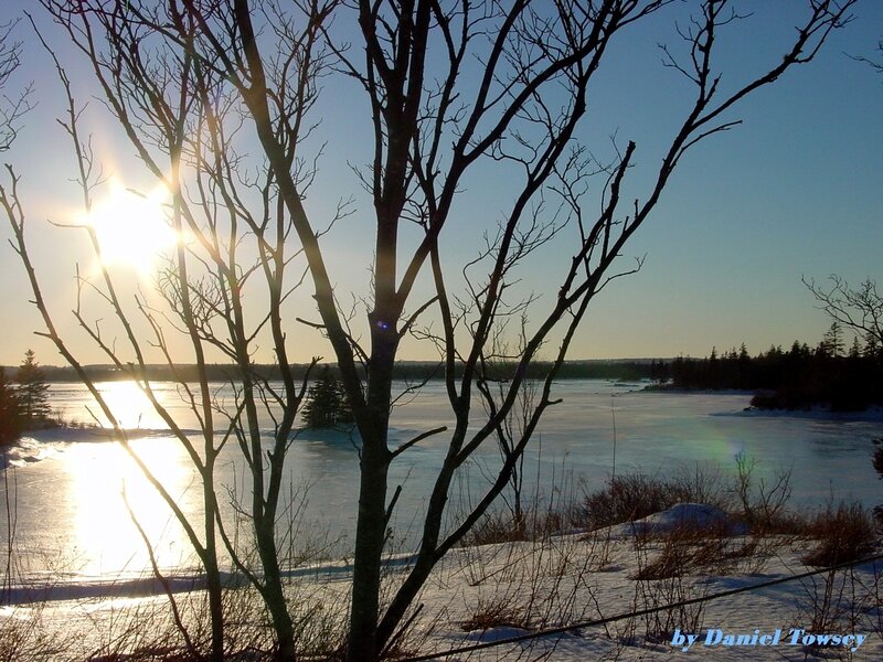 Sunset over a frozen lake