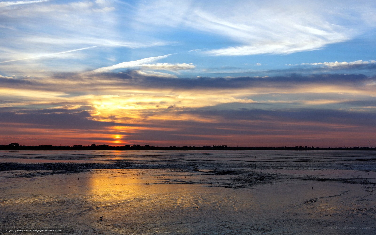 Sunset over a frozen lake