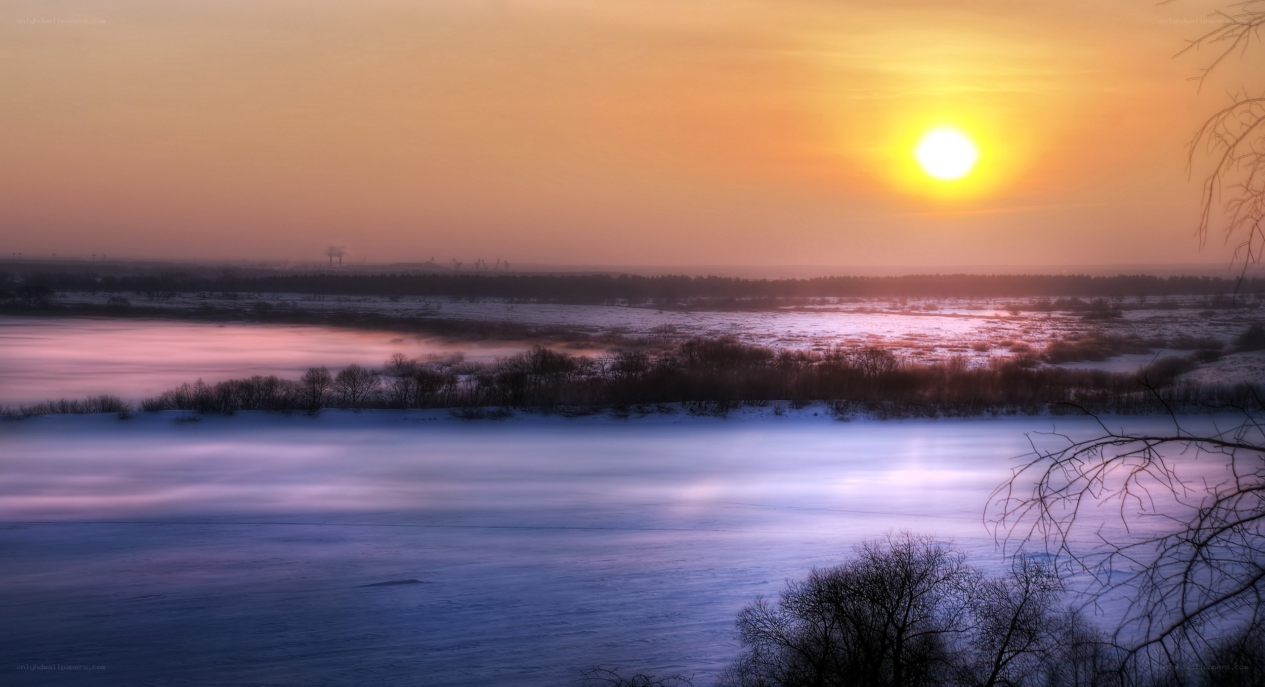 Sunset over a frozen river