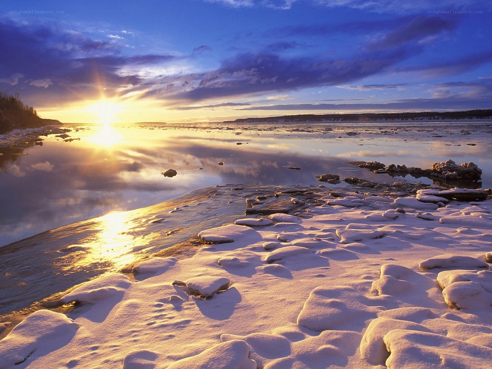 Sunset over a frozen river