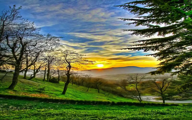 Sunset over a green valley