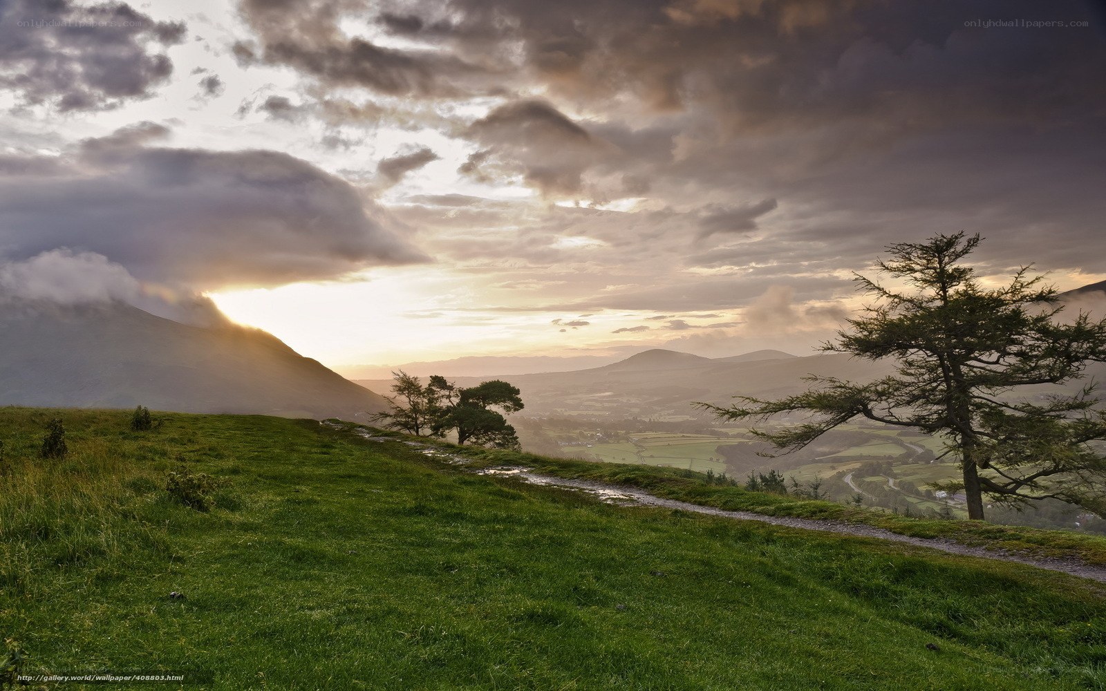 Sunset over a green valley
