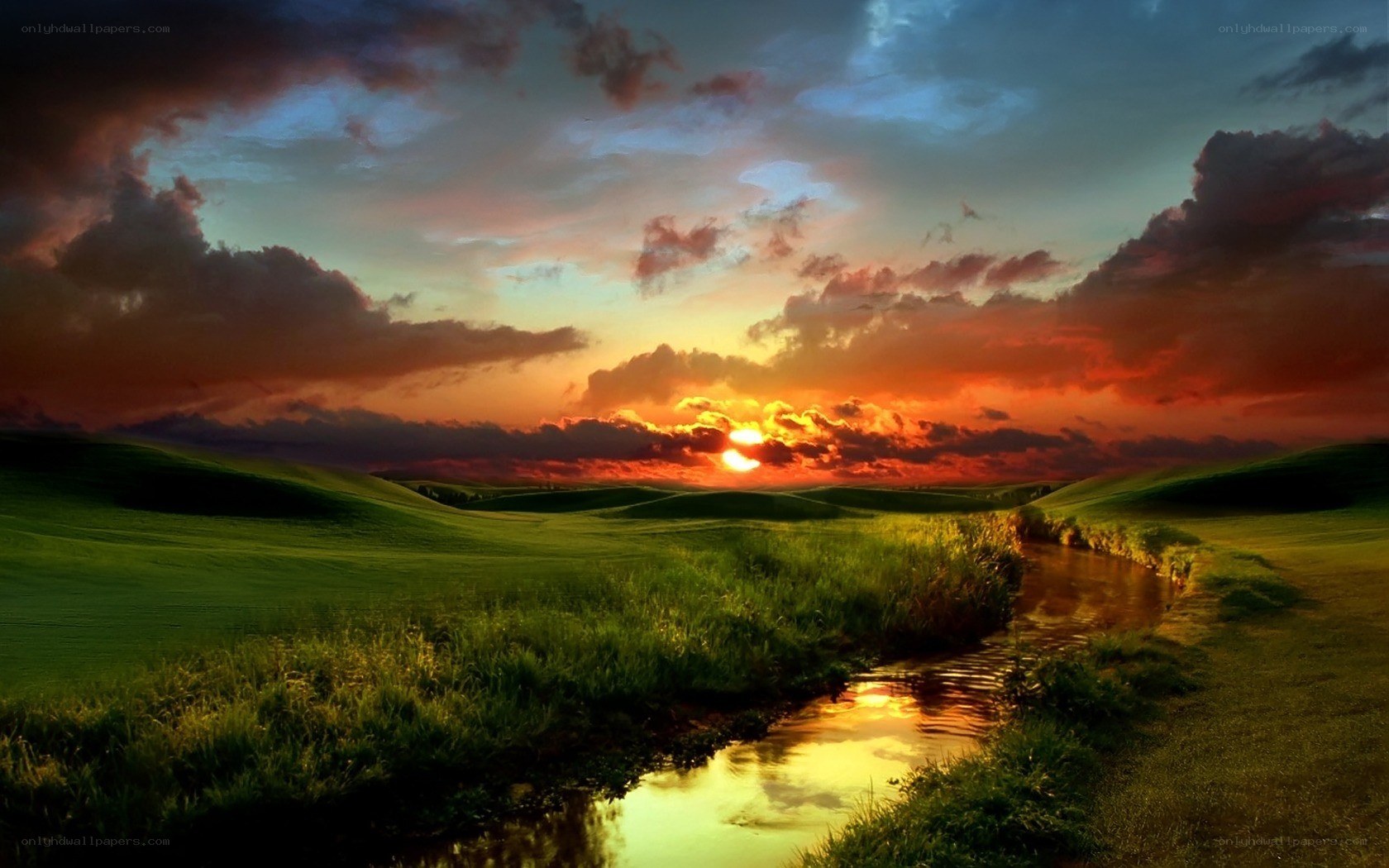 Sunset over a green valley