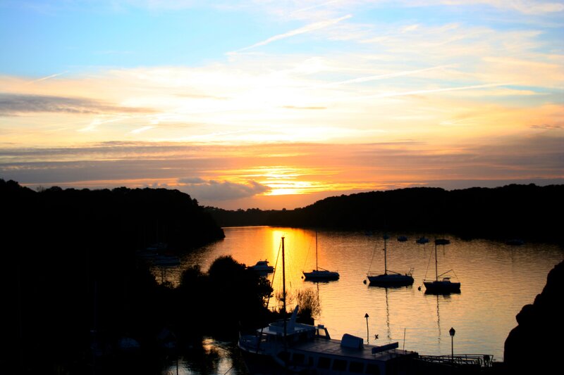 sunset over a harbor