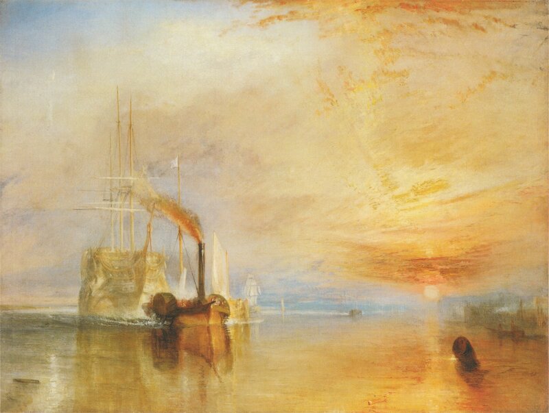 Sunset over a harbor with ships