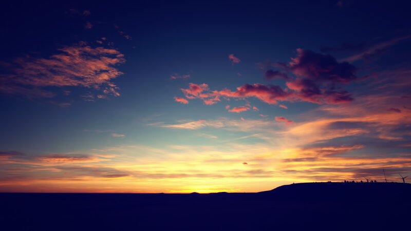 sunset over a hill