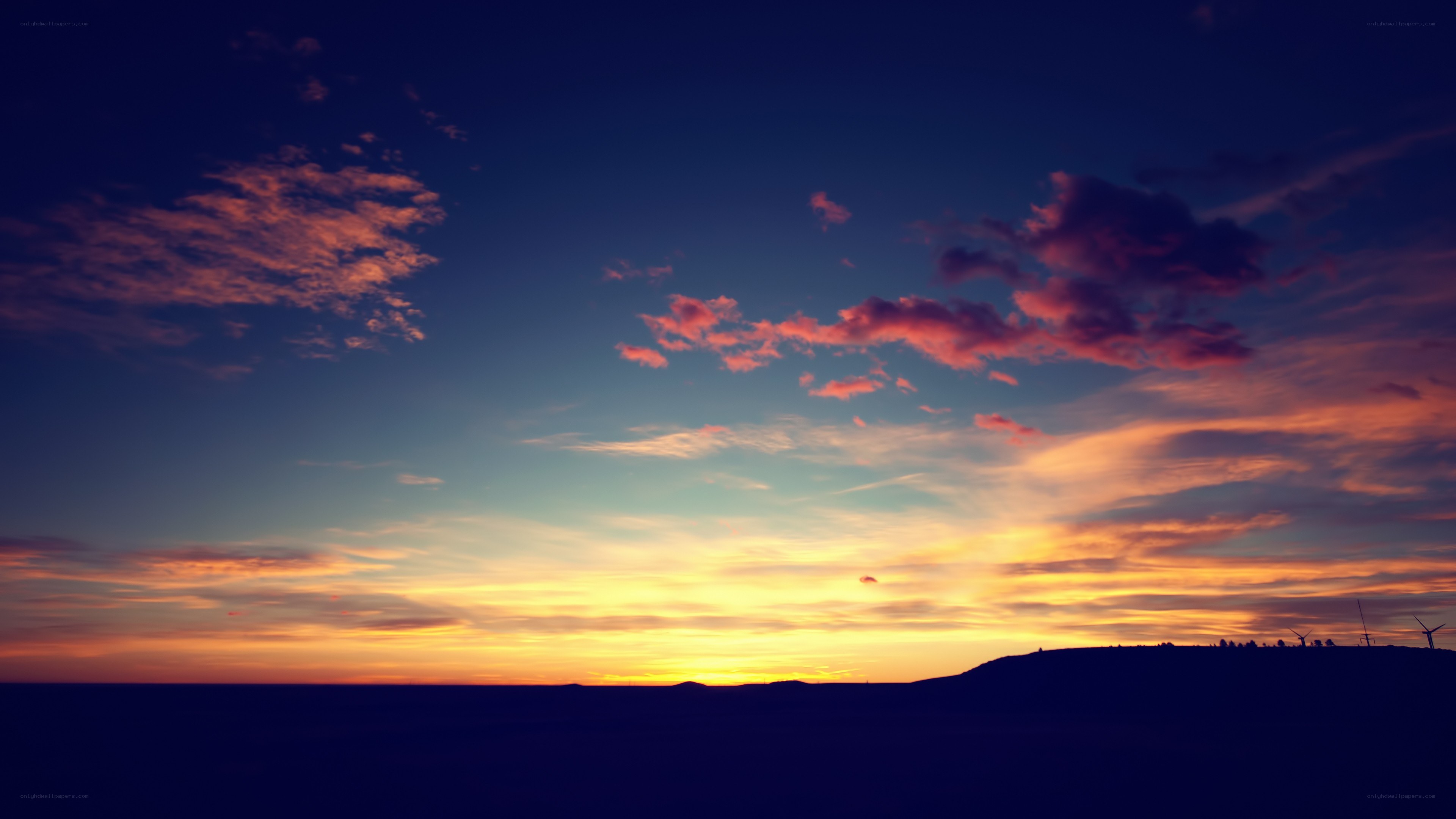 sunset over a hill