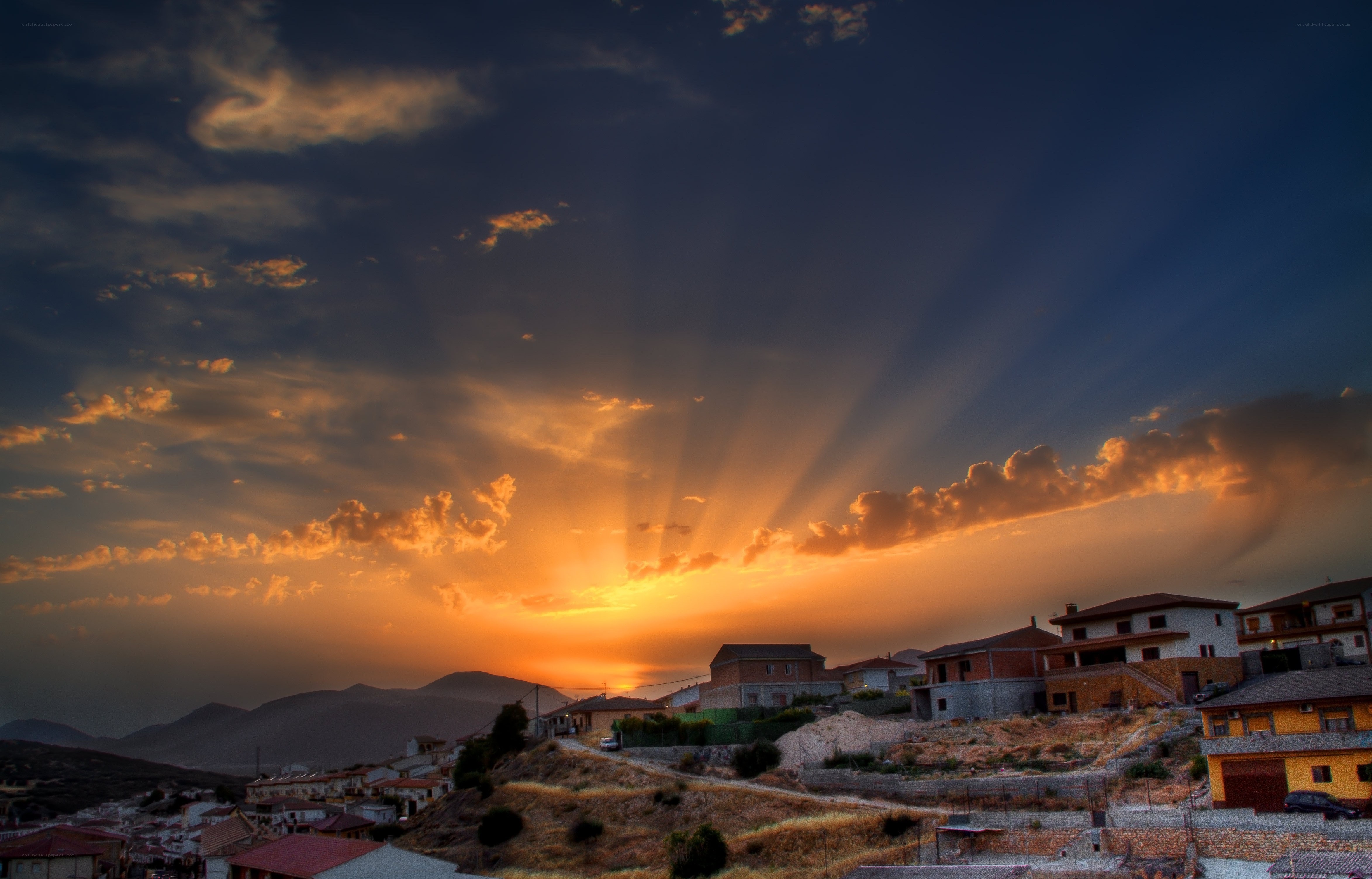 Sunset over a hillside village