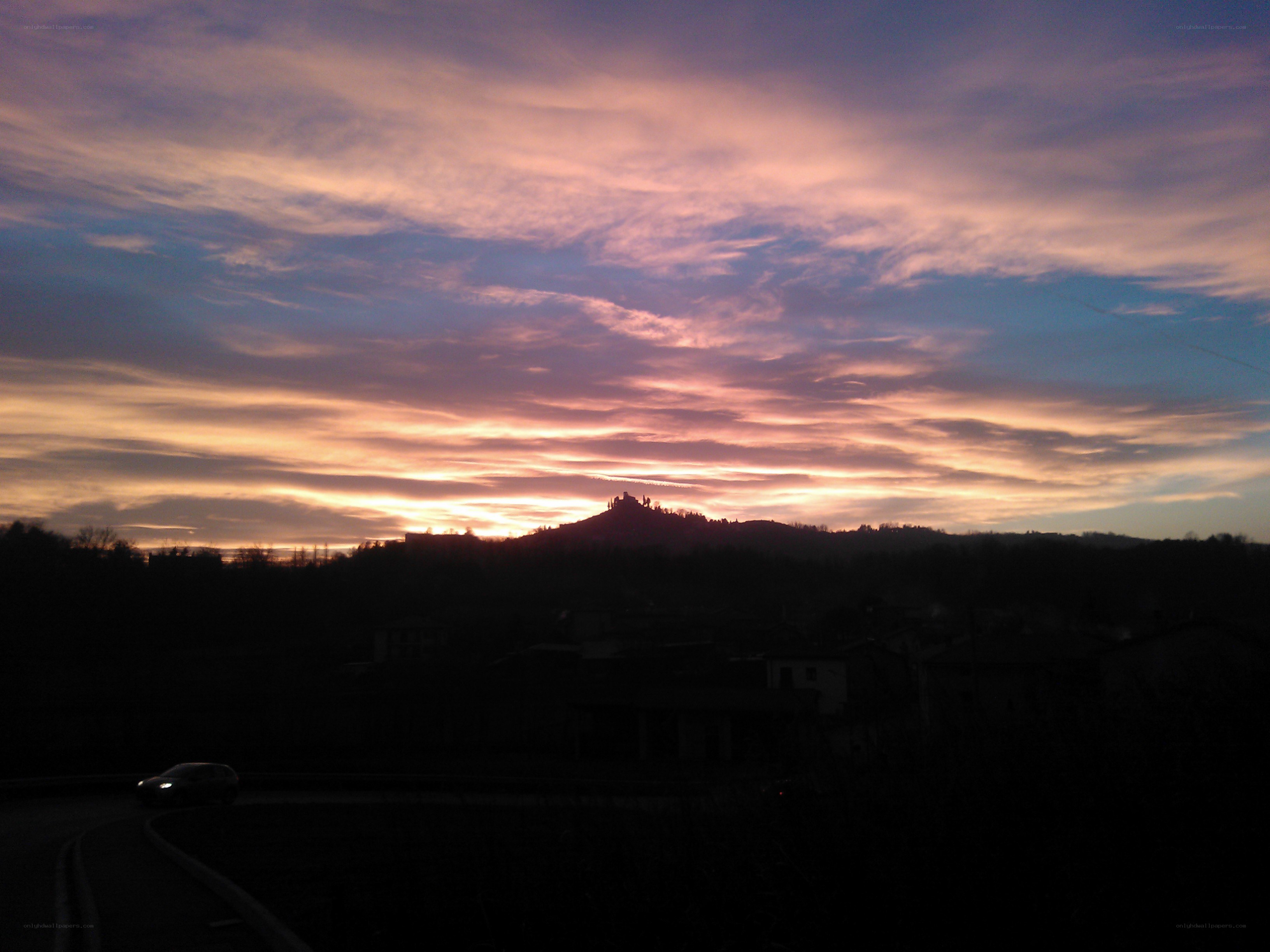 Sunset over a hilltop village