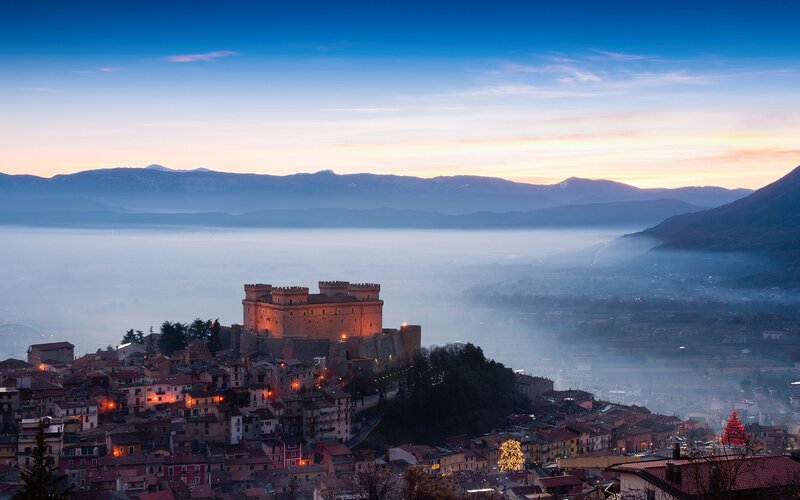 Sunset over a historic castle town
